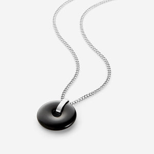 A men’s necklace featuring a black onyx circular stone pendant on a silver chain, with engraved Arabic calligraphy on the silver bail.