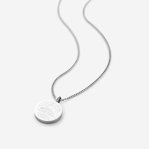 Silver Al-Aqsa ‘Free Palestine’ Necklace featuring a round pendant with engraving, on a white background