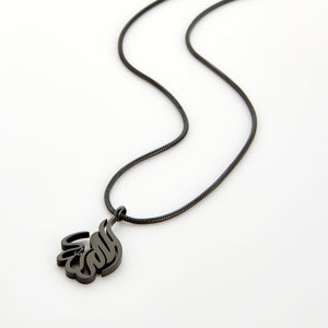 Black calligraphy necklace spelling 'Alhamdulillah' on a matching black chain, displayed on a white background.