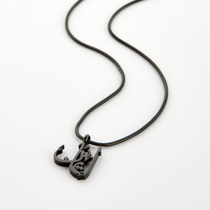 Black calligraphy necklace spelling 'Faith' in Arabic on a matching black chain, displayed on a white background.