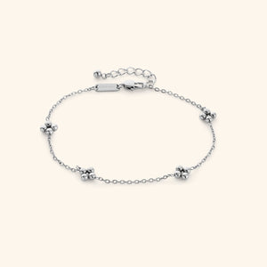 Silver Dotted Henna Anklet product-only shot on a cream background, featuring a delicate chain with evenly spaced dotted floral clusters and adjustable clasp.