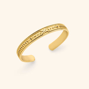 Slim 18K gold plated cuff that has the individual patterns of Palestinian tatreez embossed into the cuff.