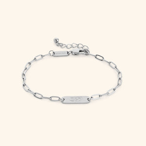 Silver My Sister Ukhti link bracelet showing the Arabic engraving on center tag, photographed against a light background.