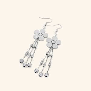 Pair of silver Raining Flower Earrings featuring floral studs with five smooth petals, suspending three dangling chains with textured silver beads.