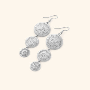 A pair of tri-coin silver plated earrings embossed with Arabic calligraphy "Sabr". The coins drape from each other with a gold double-chain.