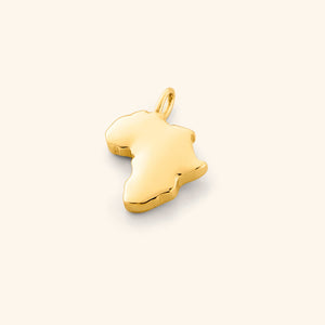 Close-up of the Africa map charm in 18K gold plating, showing its detailed and recognizable continent shape.