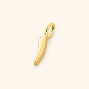 Close-up of the gold-plated Arabic number charm "1" ( featuring the same pearl backdrop and smooth finish.