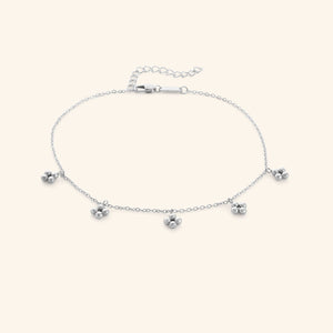Close-up of the Henna Choker in silver with delicate chain and five small clustered bead charms.