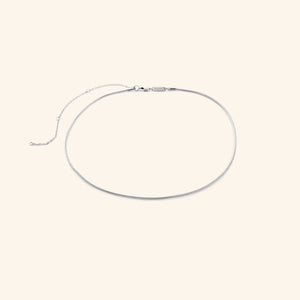 Silver harmony necklace on a white background