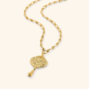 A medallion-shaped 18k gold plated necklace carved with a line from Hadith Qudsi: "Walk to Me and I will run to you." This pendant is suspended with a unique chain that interconnects oval shaped ridged links.
