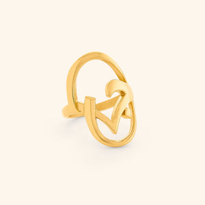Gold Jaan Ring featuring an open oval frame.