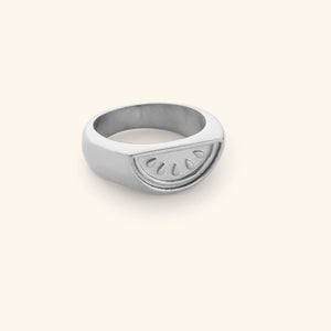 Silver ring featuring a watermelon slice design to the face of this signet ring.