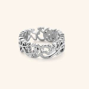Silver ring with "walk to Me, and I'll run to you" formed from calligraphic Arabic.