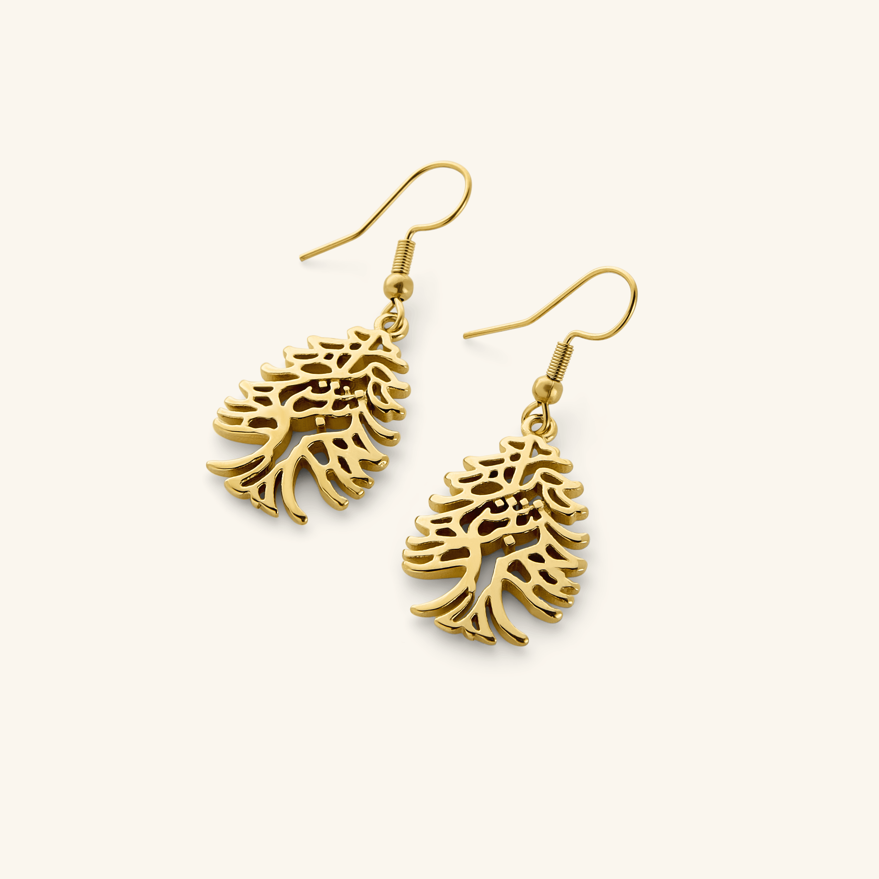 Pair of dangling 18K gold plated earrings featuring  the Arabic phrase "Freedom is the soul", swirled into the shape of the Cedar of Lebanon tree.