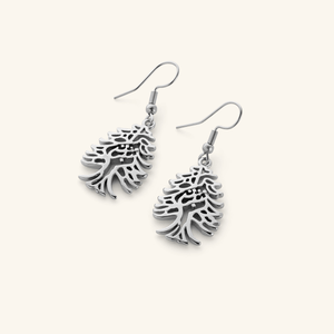 Pair of dangling silver earrings featuring  the Arabic phrase "Freedom is the soul", swirled into the shape of the Cedar of Lebanon tree.