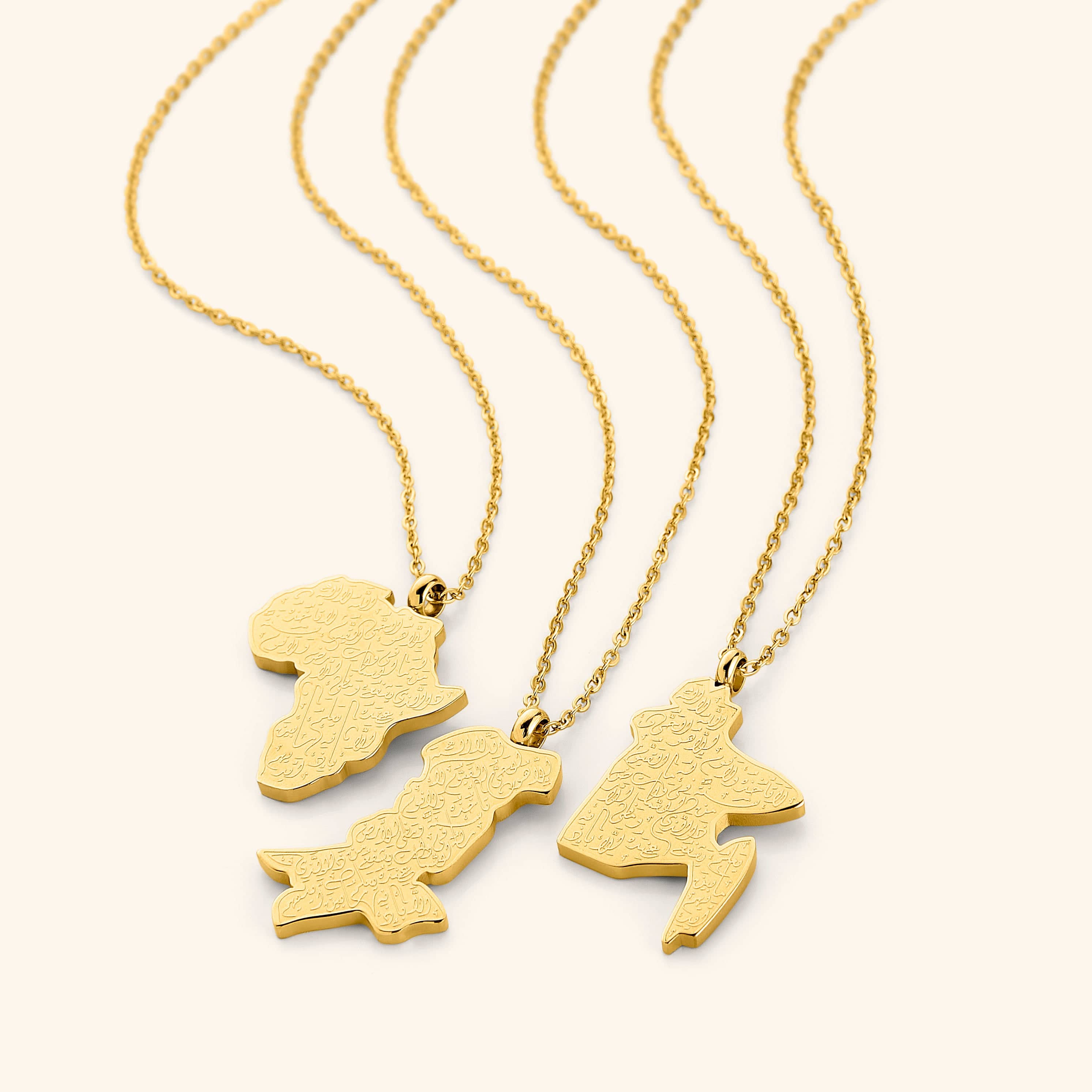 A close-up shot of the pendant, showcasing the detailed Arabic engraving of Ayatul Kursi on the gold-plated country-shaped pendants.