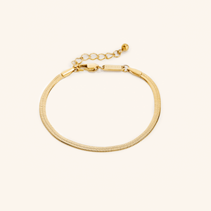 Photo of the 18k gold plated bracelet that features interlocked slanted links in a style that dates back to Ancient Egypt.