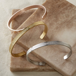 Photo of the 4 Qul Cuff | Women in Rose Gold, Gold, and Silver.