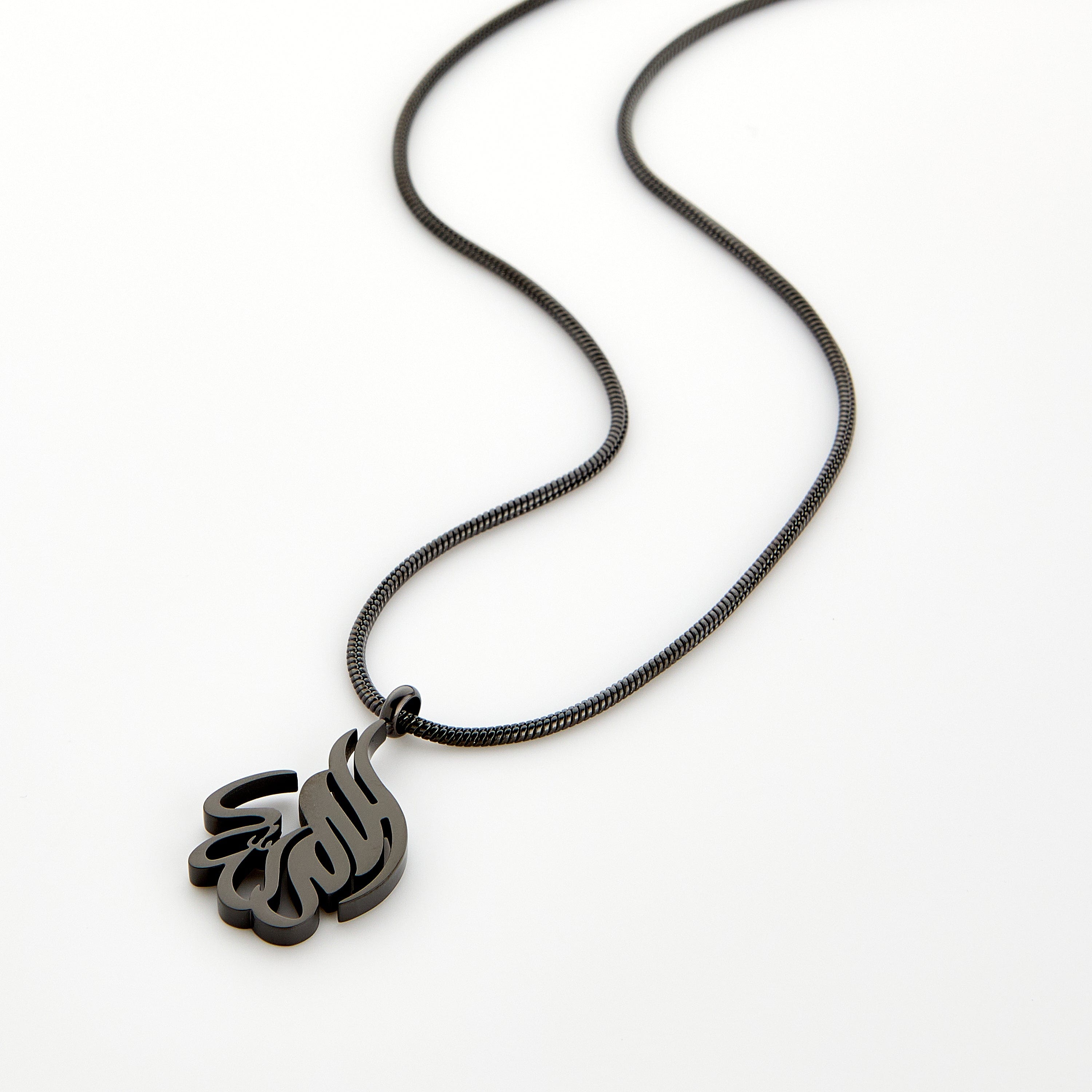 Black calligraphy necklace spelling 'Alhamdulillah' on a matching black chain, displayed on a white background.