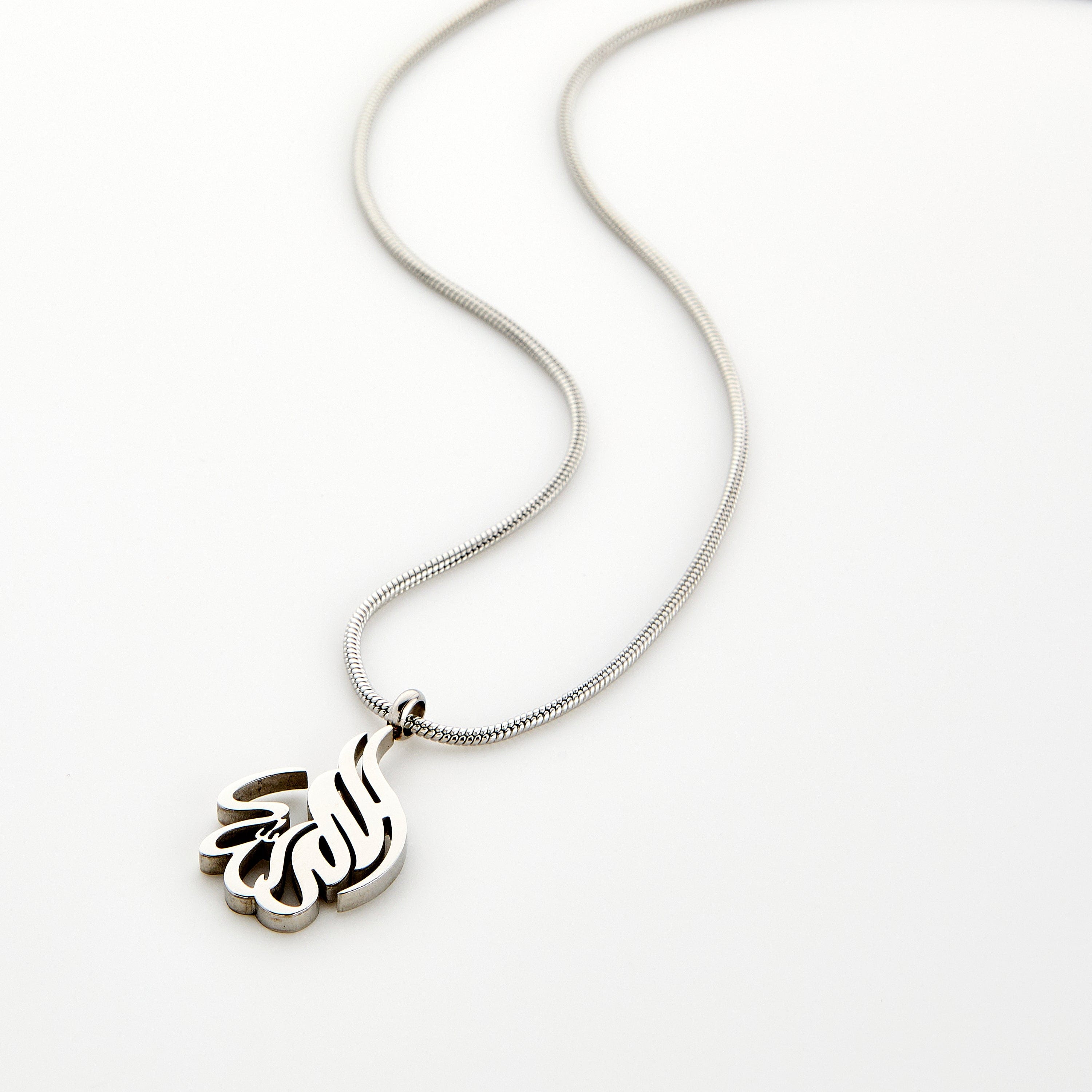 Silver calligraphy necklace spelling 'Alhamdulillah' on a chain, displayed on a white background.