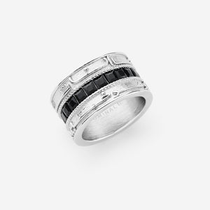 A silver ring that features a wide band carved with part of verse 2:216 from the Qur'an: "Perhaps you dislike what is good for you" and onyx stones set at the center.