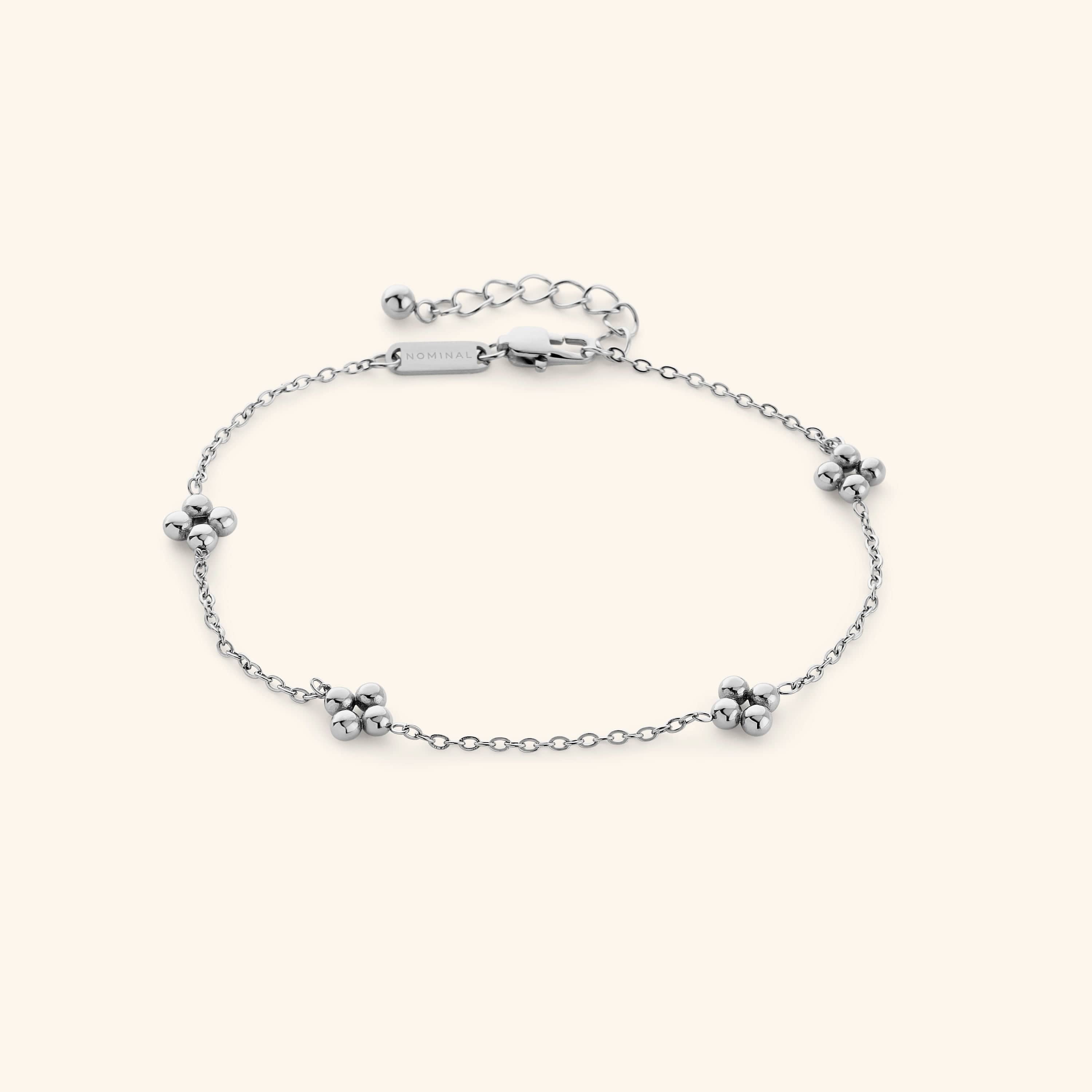 Silver Dotted Henna Anklet product-only shot on a cream background, featuring a delicate chain with evenly spaced dotted floral clusters and adjustable clasp.