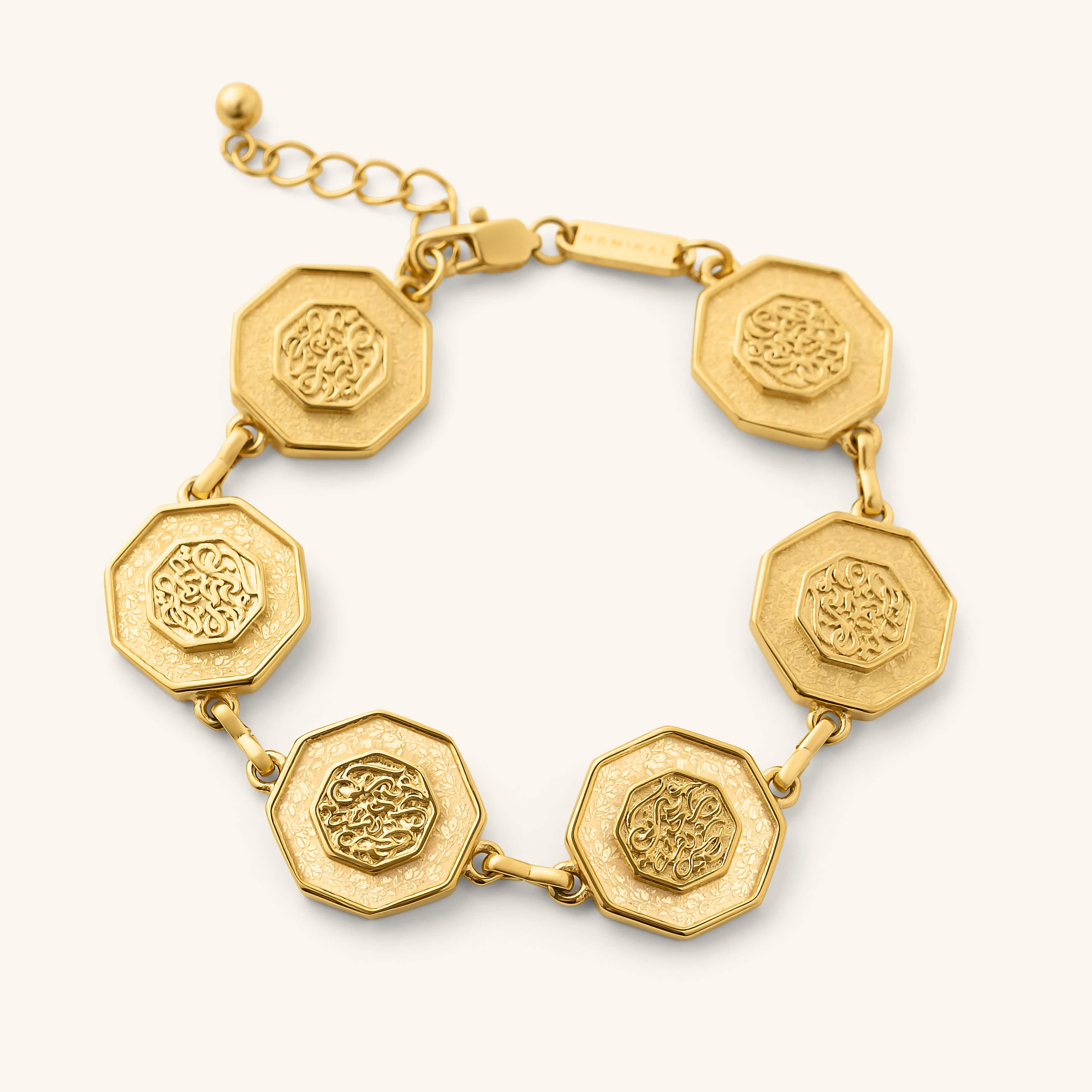 “Our Roots Run Deep” Dotted Bracelet in gold featuring octagon-shaped engraved links connected by small chains.