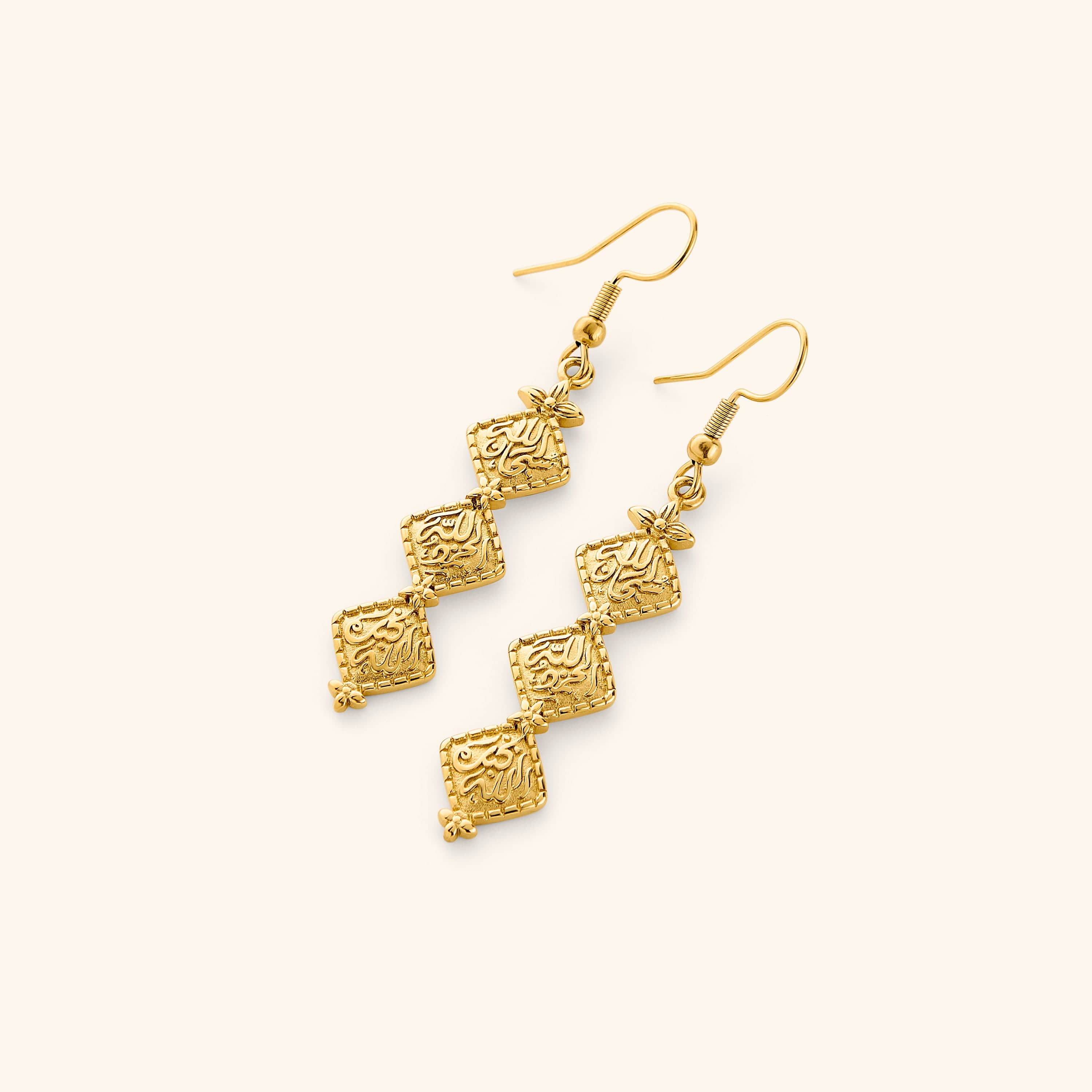 A pair of 18K gold plated earrings with vintage tradition of hammered gold while embossing thikr (the remembrance of Allah) on each diamond-shaped plate design.