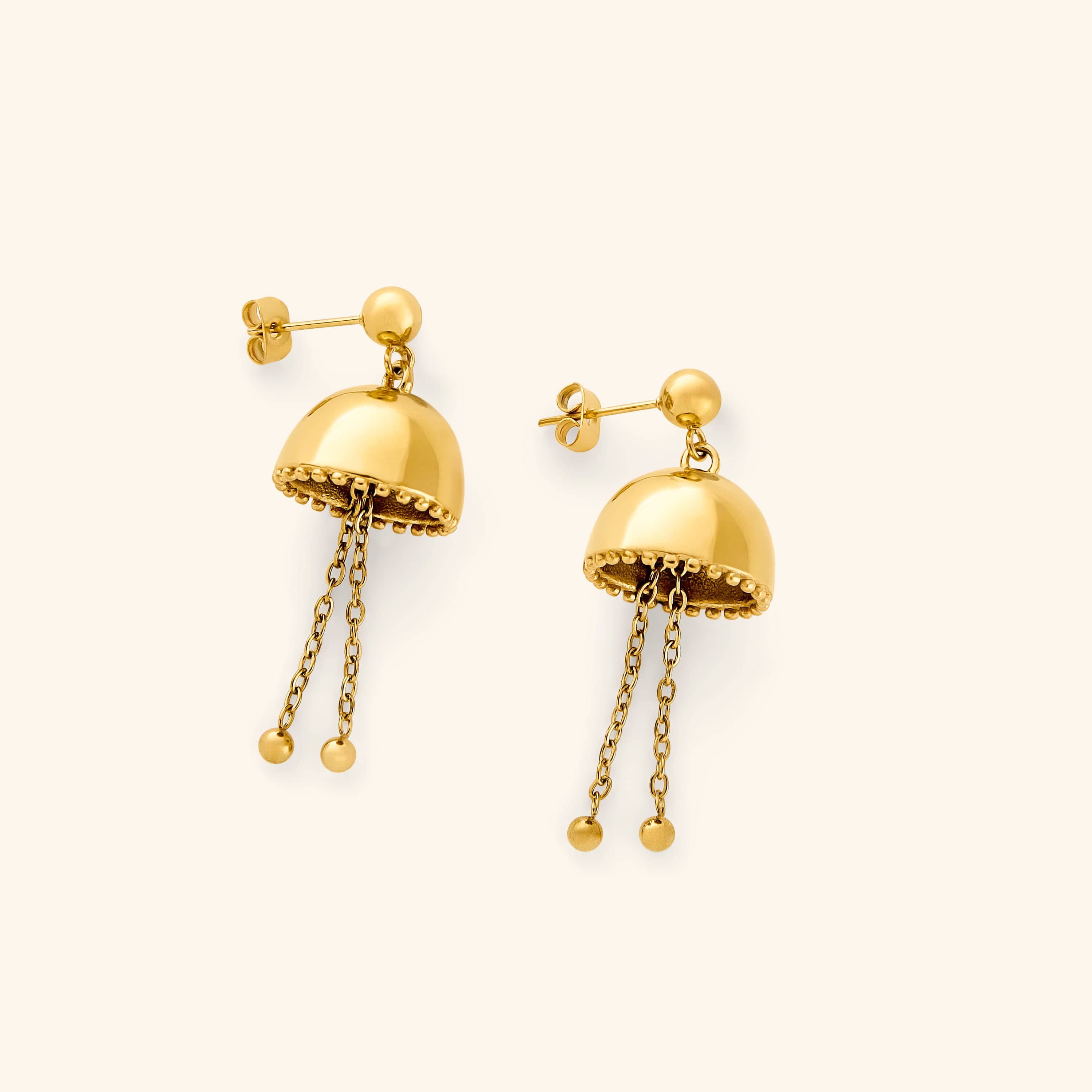 Gold Jhumka Earrings with a dome-shaped top, delicate beaded edge, and twin dangling chains ending in small gold spheres.