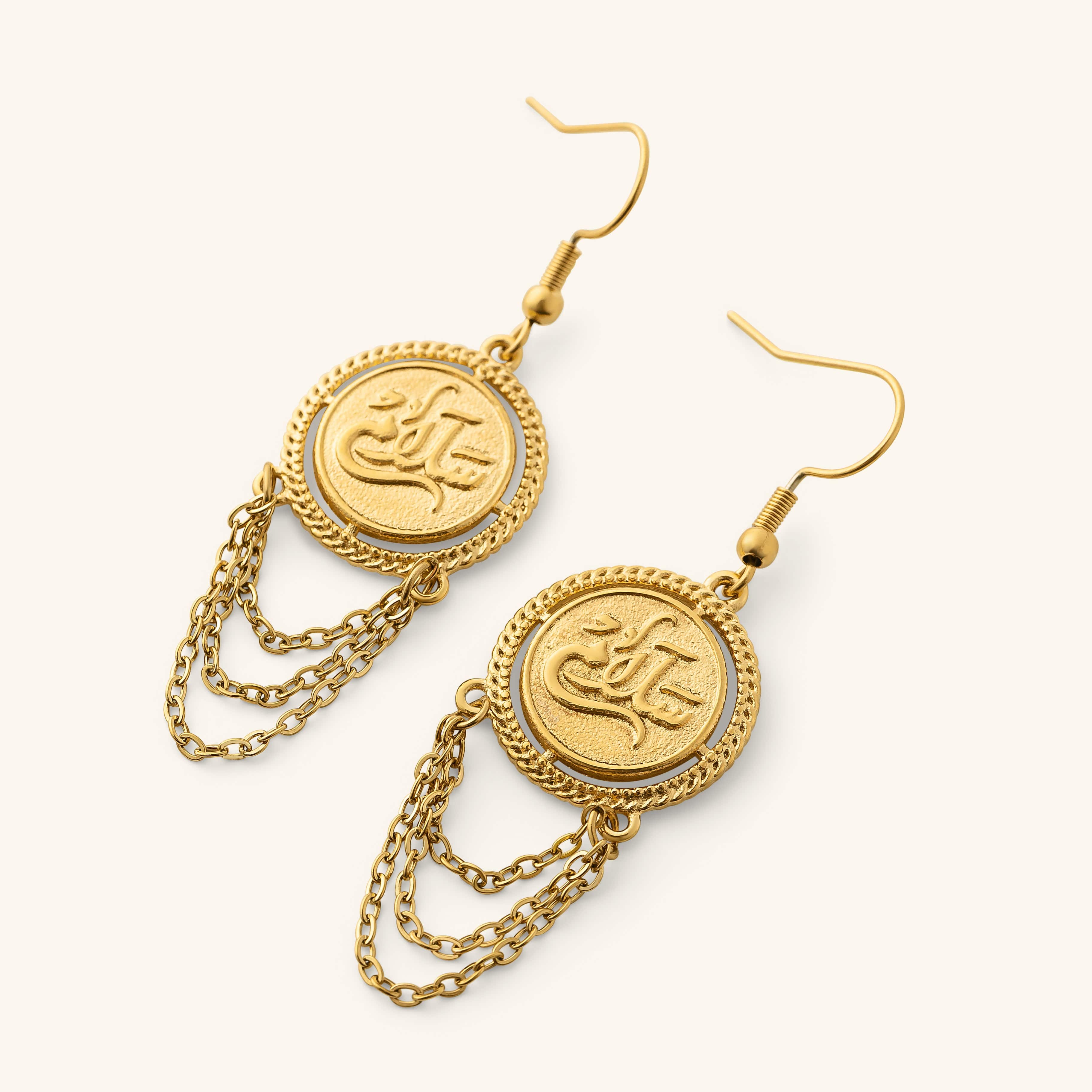 Gold Salam Vintage Token Earrings featuring round engraved Arabic calligraphy discs with layered chain tassels.