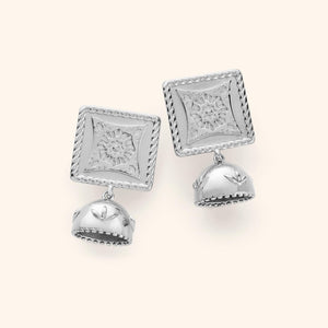 Pair of silver Square Jhumka Earrings featuring engraved square tops with floral star patterns and dangling dome-shaped jhumkas with leaf motifs, displayed on a neutral background.