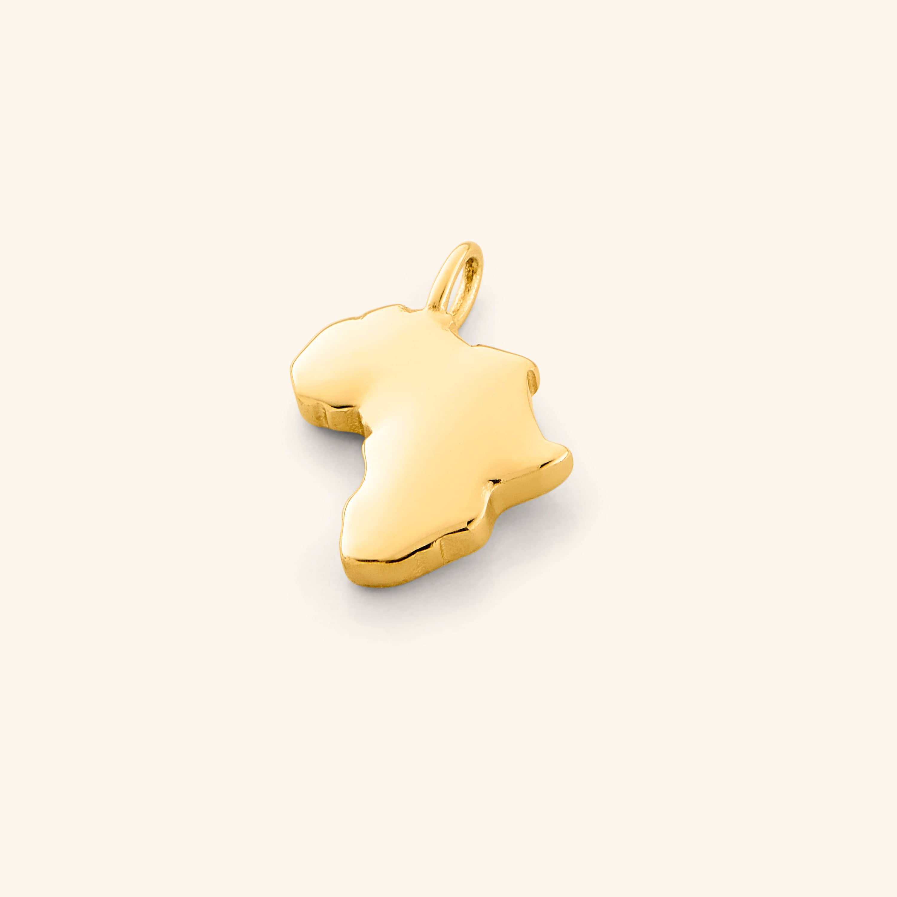 Close-up of the Africa map charm in 18K gold plating, showing its detailed and recognizable continent shape.