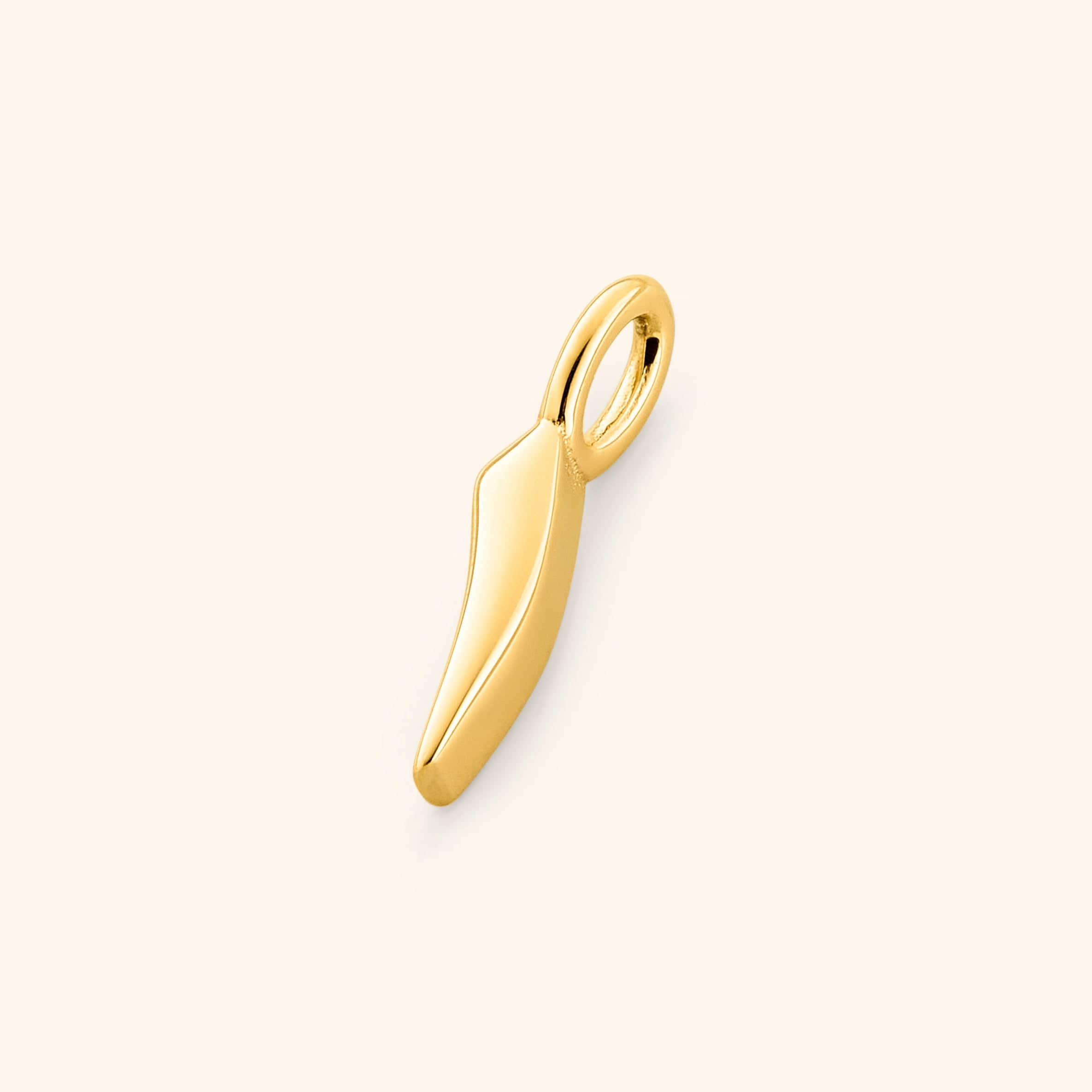 Close-up of the gold-plated Arabic number charm "1" ( featuring the same pearl backdrop and smooth finish.