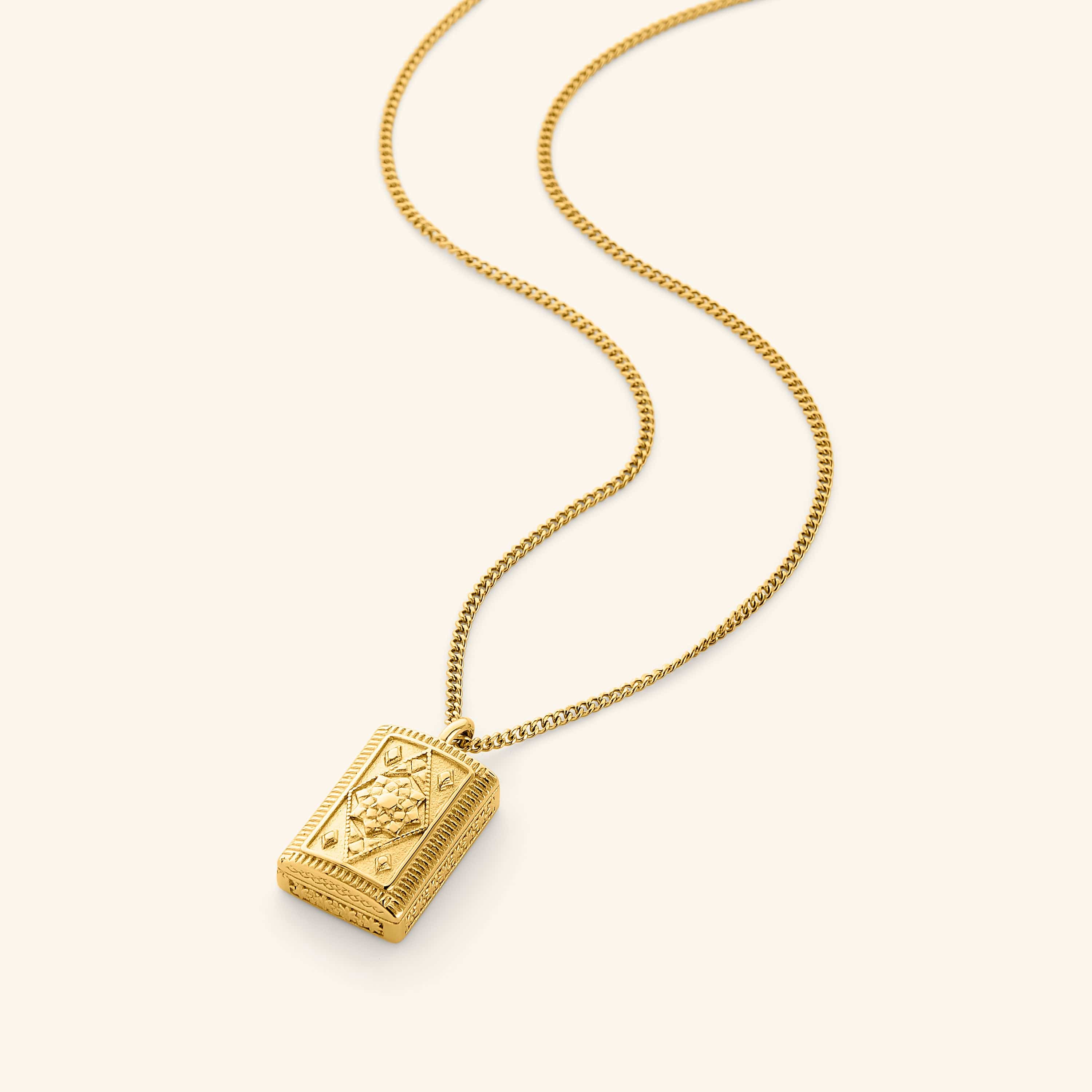 18K gold plated rectangular box pendant embossed with a mosaic pattern and the iconic Jasmine of Syria that hangs on flat cuban chain. 