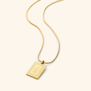 Gold Handala Necklace on a white background
