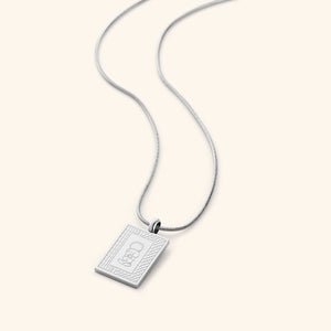 Silver Handala Necklace on a light background