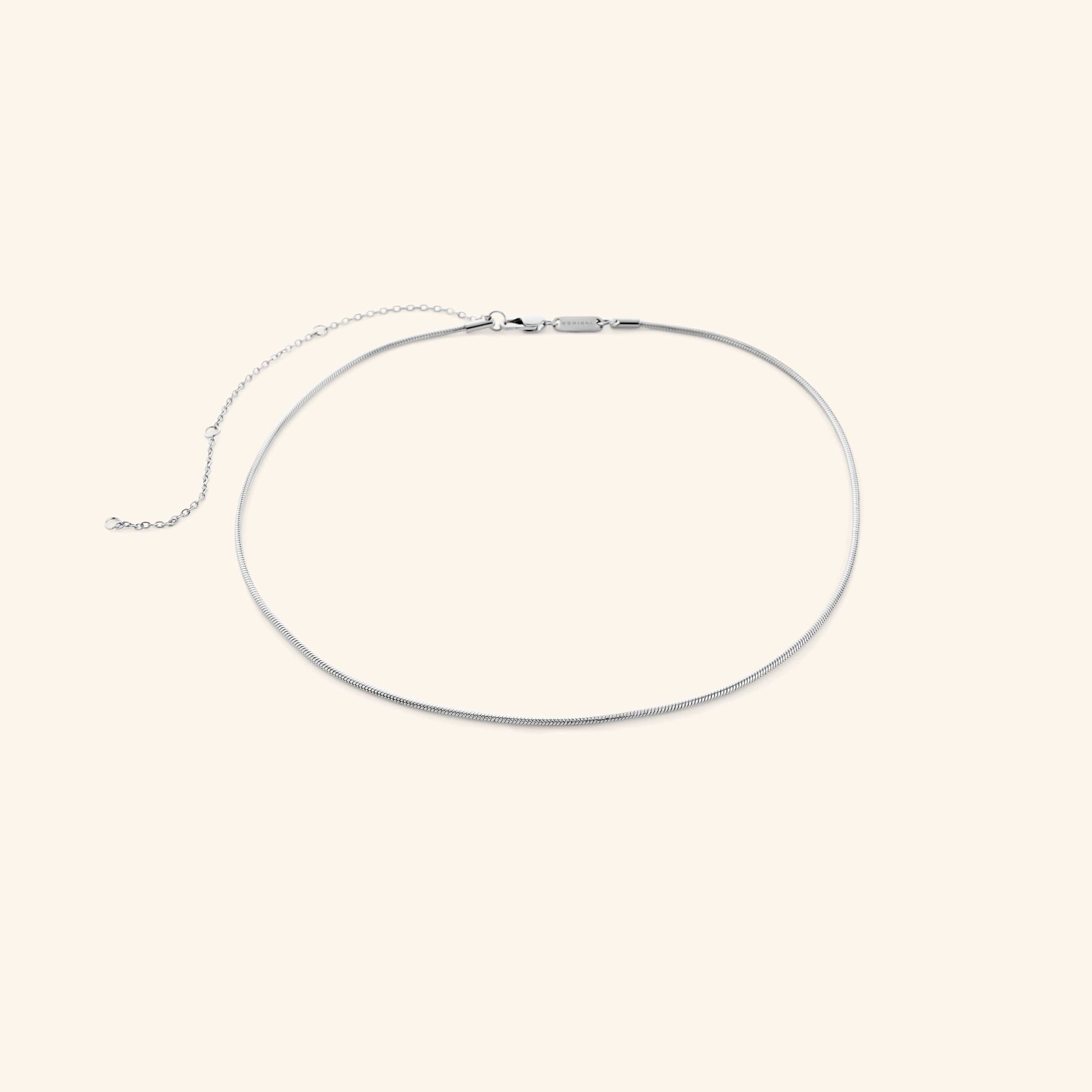 Silver harmony necklace on a white background