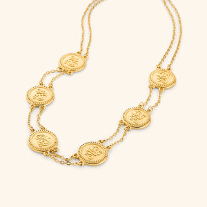 18k gold plated layered necklace strung with coins stamped with إيمان (faith) in Arabic.