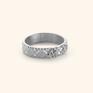 Silver ring featuring patterns found in mosaics of Syria, embossed with Jasmine flower design.