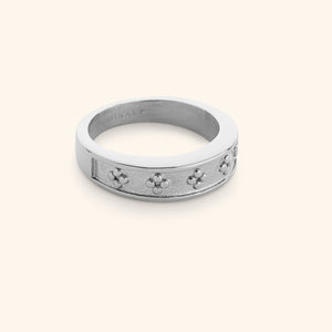Silver Dotted Henna Ring displayed on a neutral background, featuring the same textured dotted floral engravings.