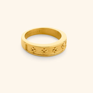 Gold Dotted Henna Ring shown against a neutral background, featuring a textured band engraved with repeating dotted floral patterns.