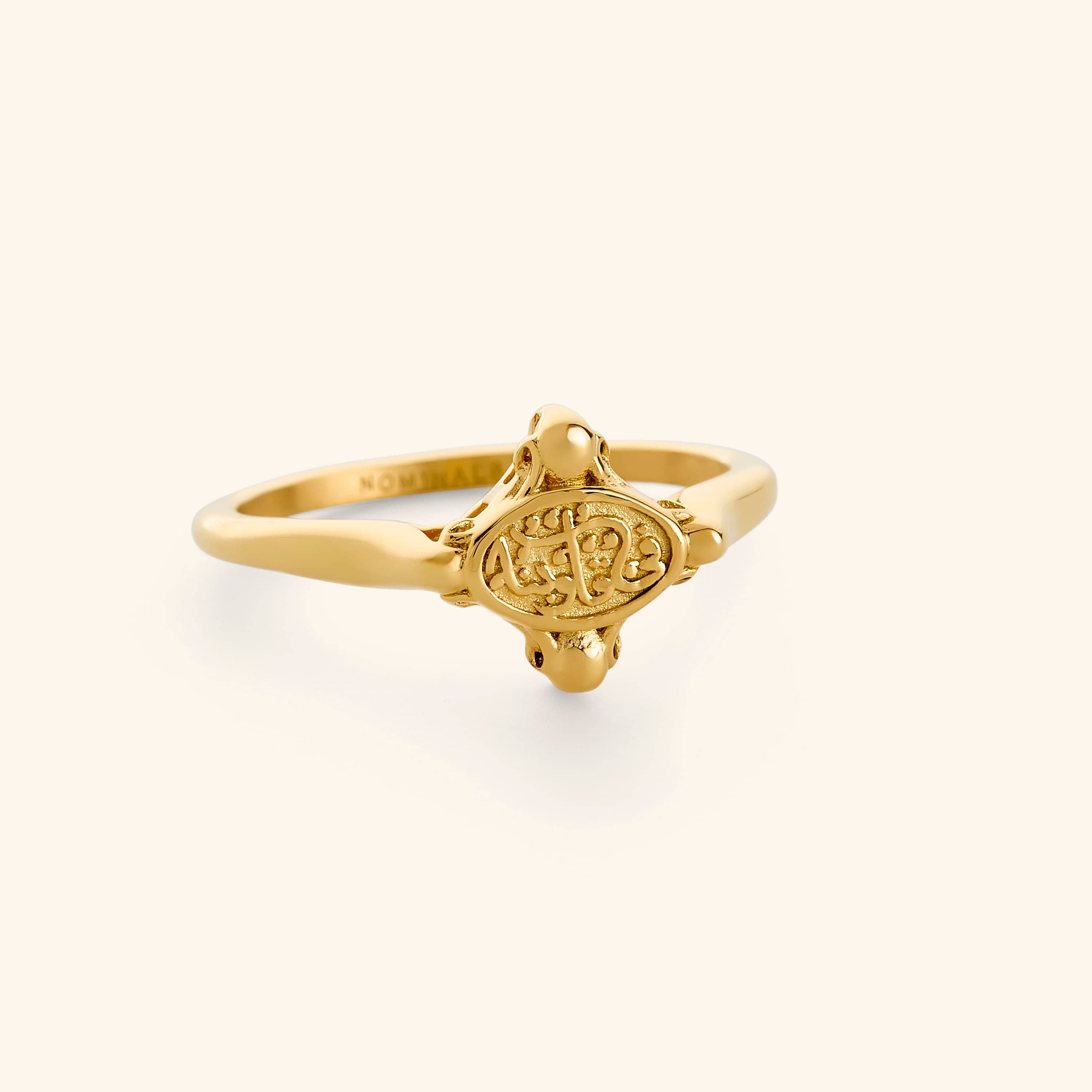 18K gold plated minimal ring with "in our hearts" inscription on its plate.