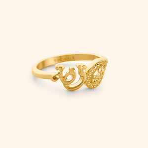 18K Gold plated minimal band ring with the word "strength" in Arabic Calligraphy and swirling paisley design. Inside ring engraving reads "Nominal"