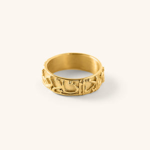 A gold ring that is embossed with one one of the most comforting promises in Islam, a hadith qudsi where Allah says: "If My servant comes to Me walking, I go to him running." (Sahih Bukhari) pressed into a vintage band.
